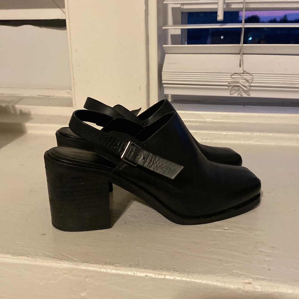 Intentionally blank black leather mules. Size 7